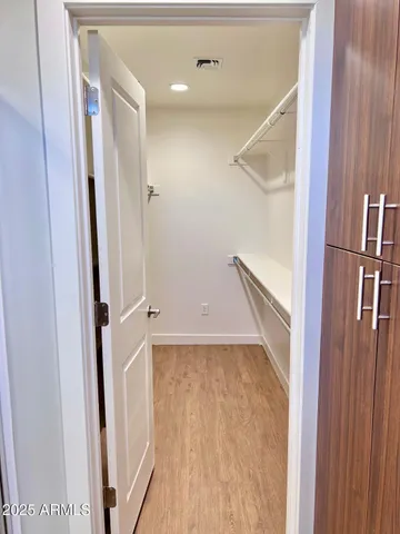 a bathroom with a sink a mirror and vanity