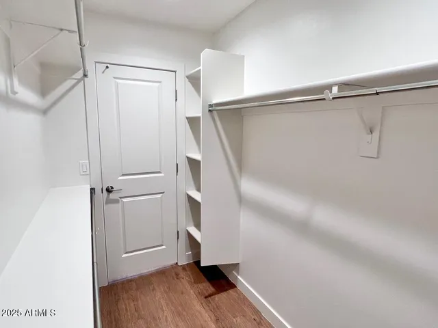 a bathroom with a shower and a bath tub