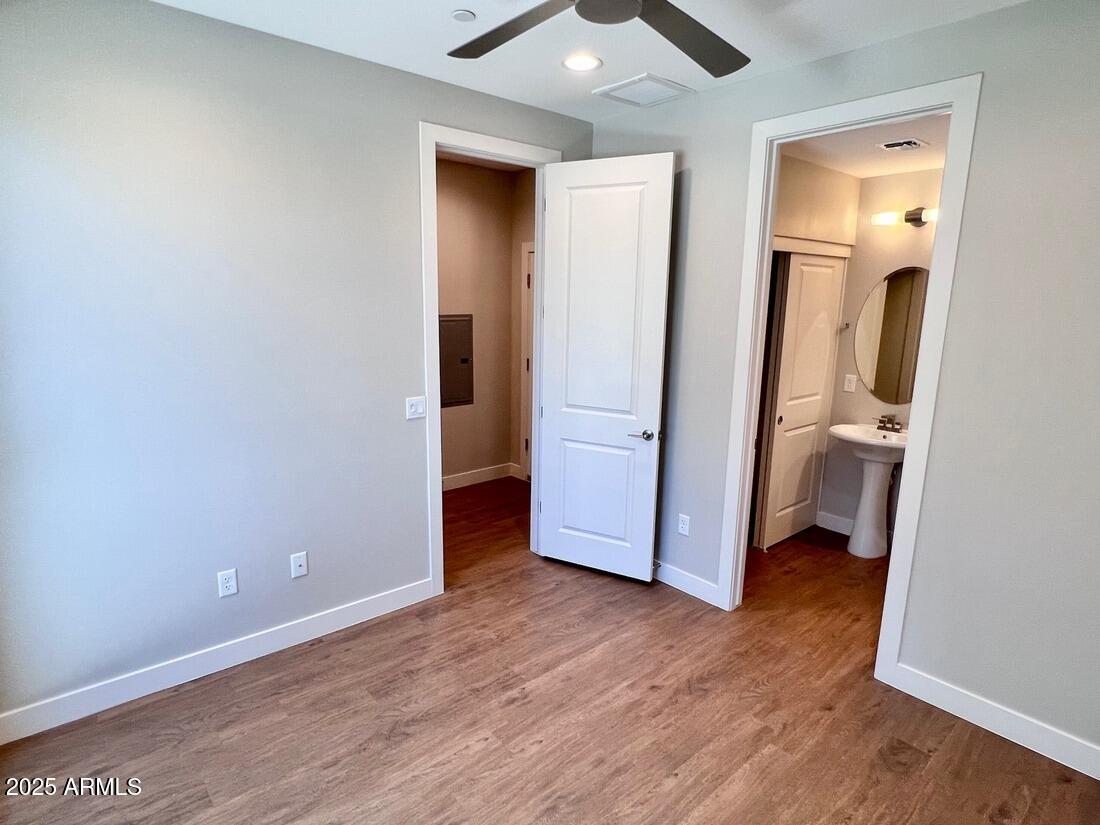 915 East Missouri Avenue, Unit 10 Phoenix, AZ 85014 - Photo 37 of 61 wooden floor in an empty room and a gallery