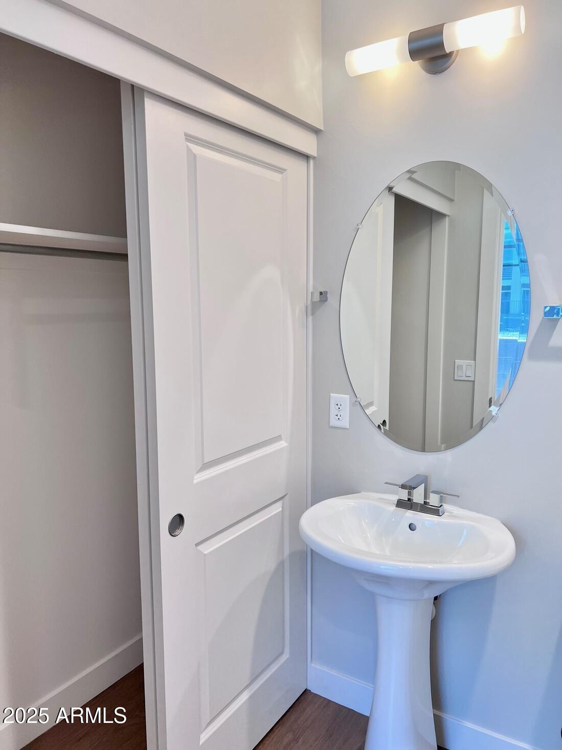 915 East Missouri Avenue, Unit 10 Phoenix, AZ 85014 - Photo 38 of 61 a bathroom with a sink a mirror and vanity