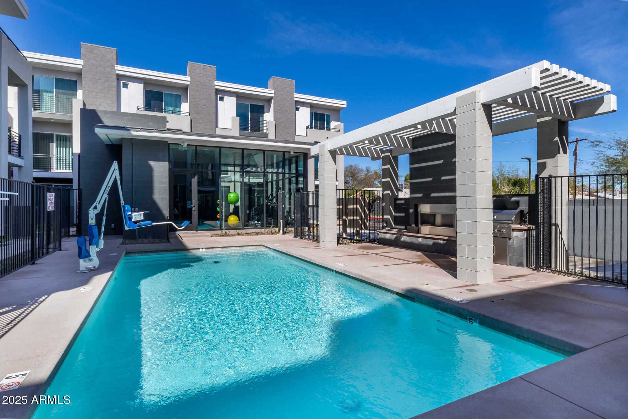 915 East Missouri Avenue, Unit 10 Phoenix, AZ 85014 - Photo 45 of 61 a view of a building with a backyard