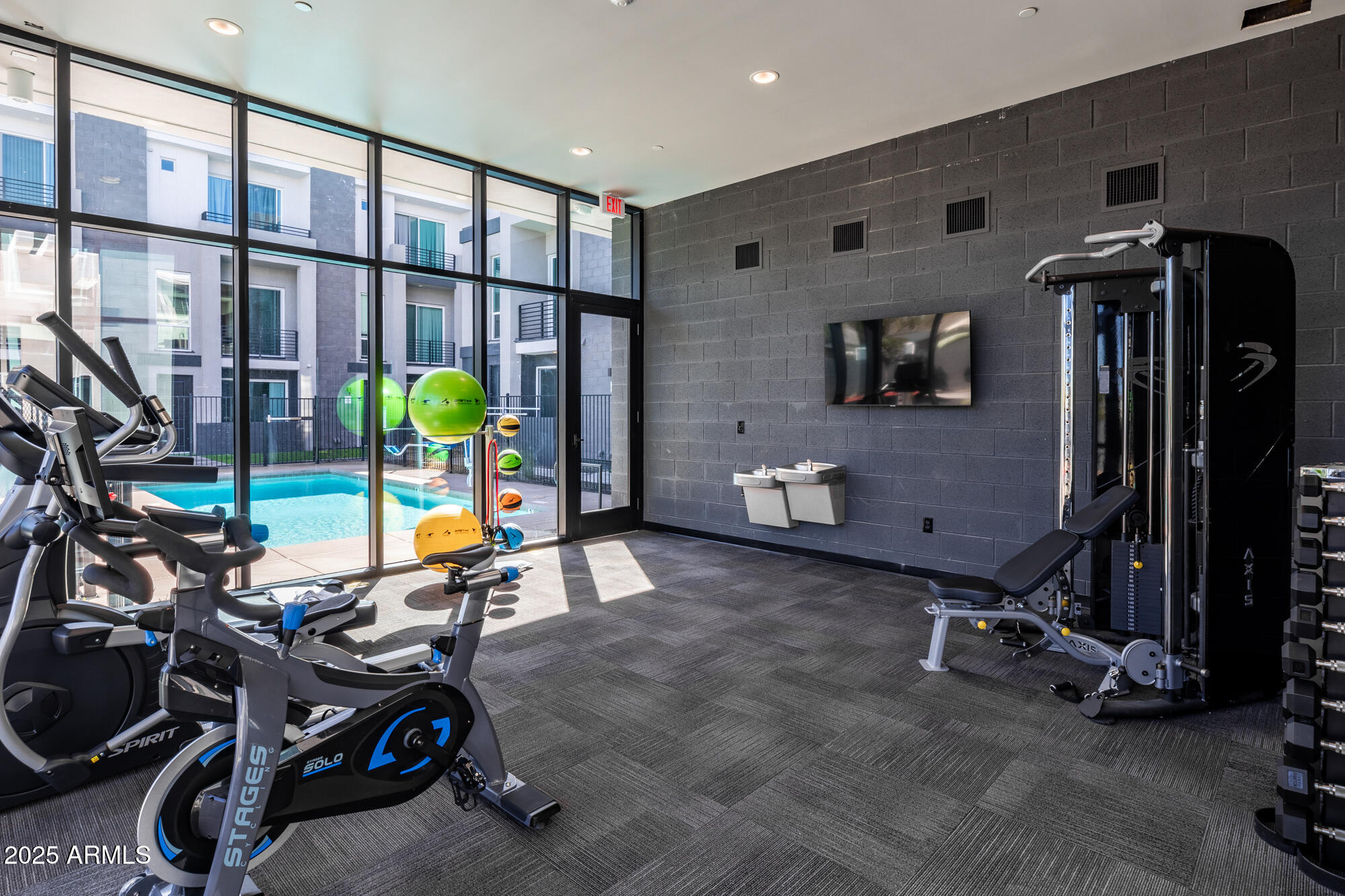 915 East Missouri Avenue, Unit 10 Phoenix, AZ 85014 - Photo 49 of 61 a view of a room with gym equipment