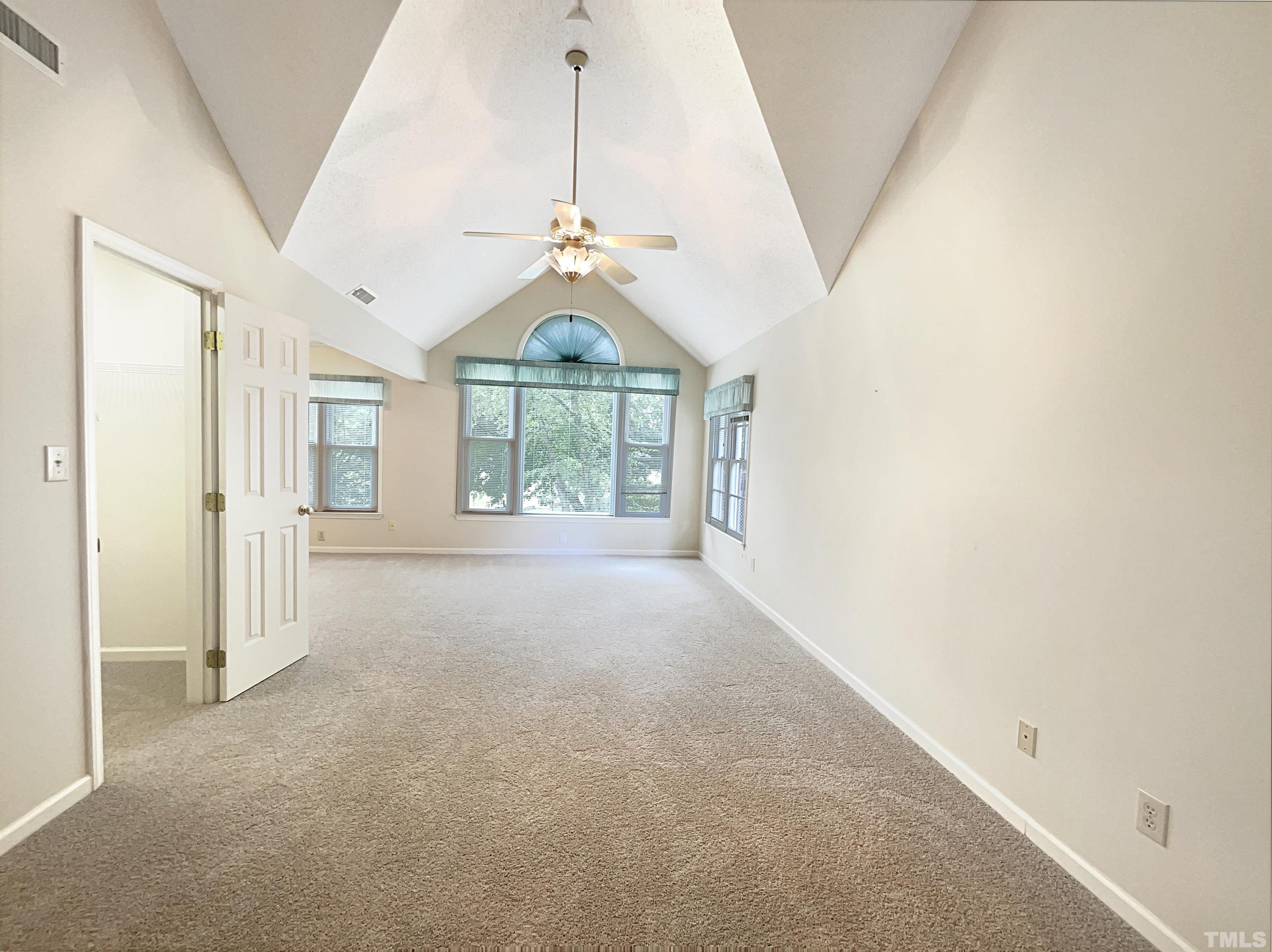 1749 Kingston Heath Way Raleigh, NC 27604 - Photo 15 of 19 a view of an empty room with a window