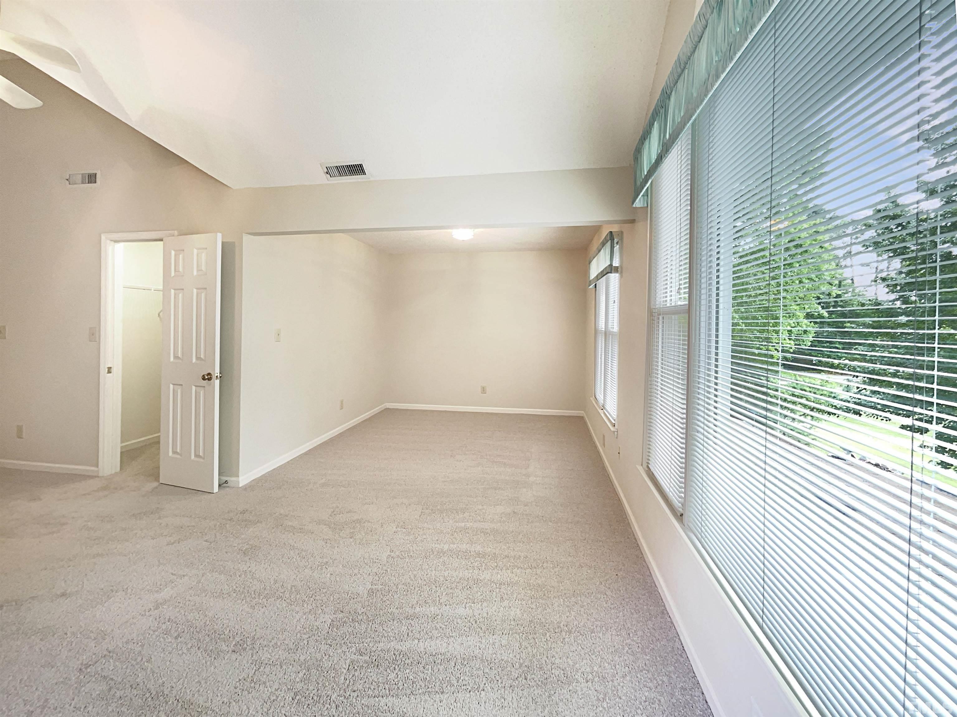 1749 Kingston Heath Way Raleigh, NC 27604 - Photo 16 of 19 a view of a room with a large window