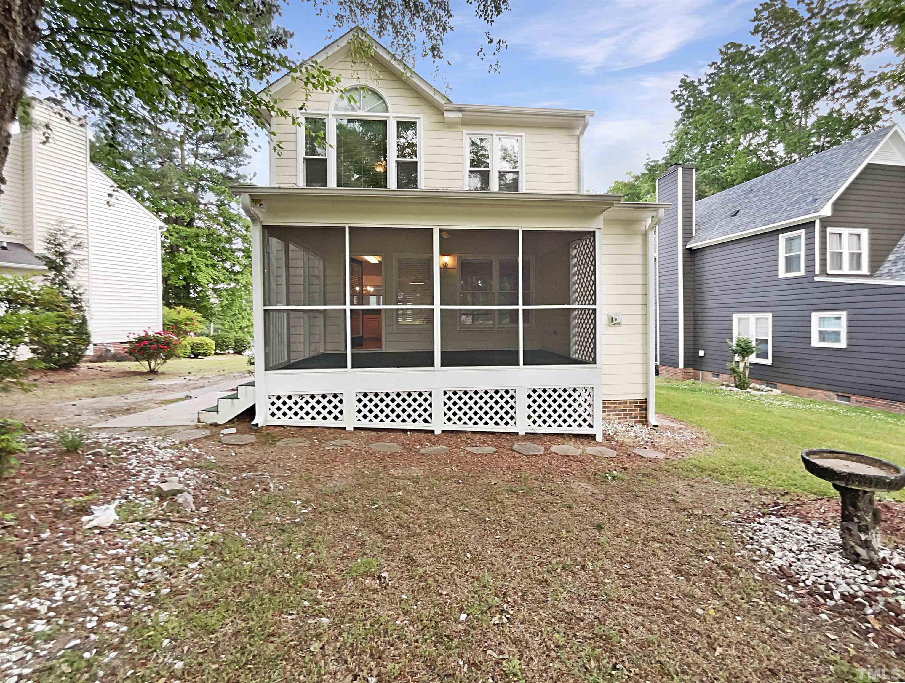 1749 Kingston Heath Way Raleigh, NC 27604 - Photo 5 of 19 a house view with a outdoor space
