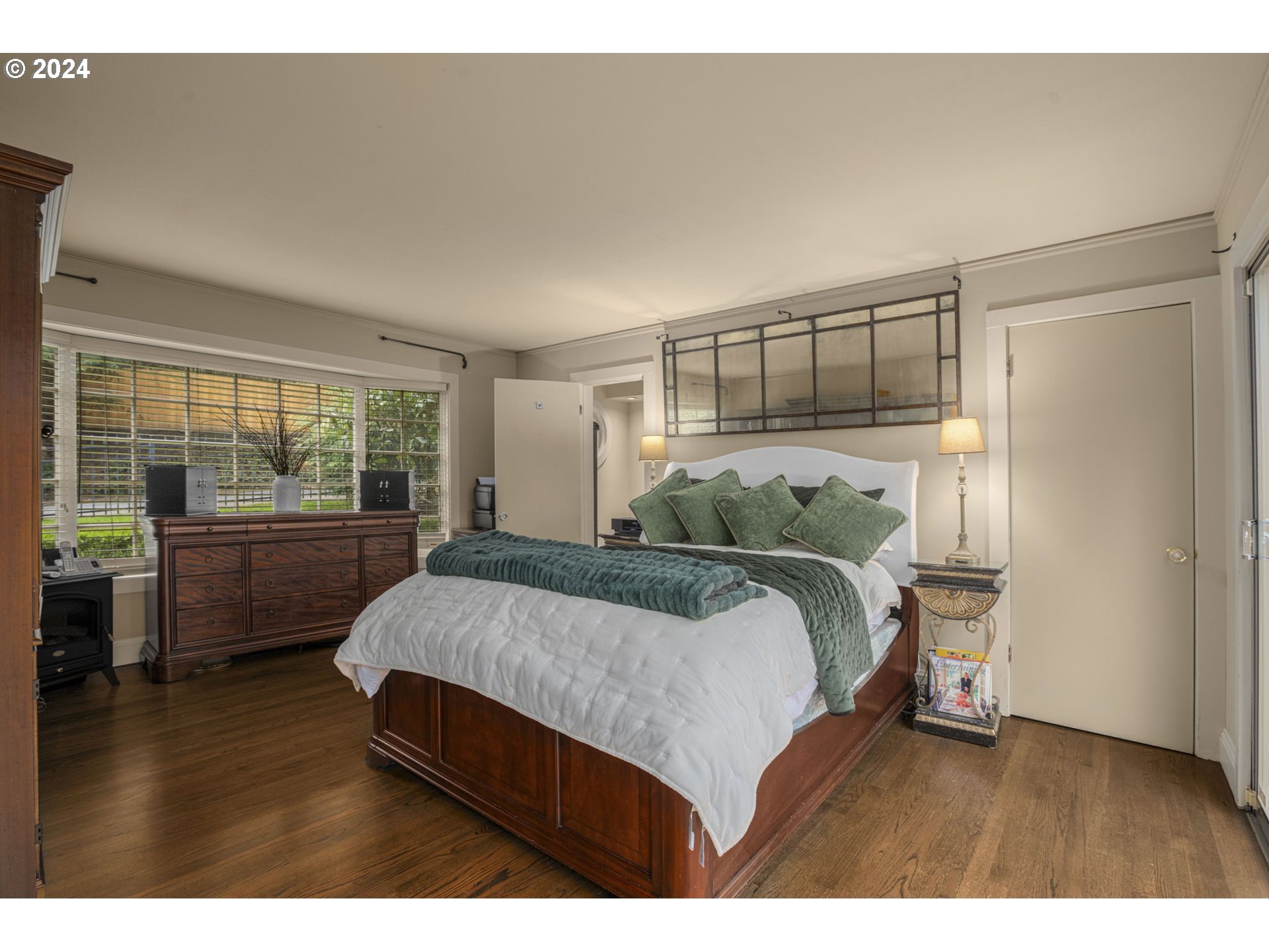 2271 Southwest Montgomery Drive Portland, OR 97201 - Photo 16 of 25 a bedroom with a bed and a window