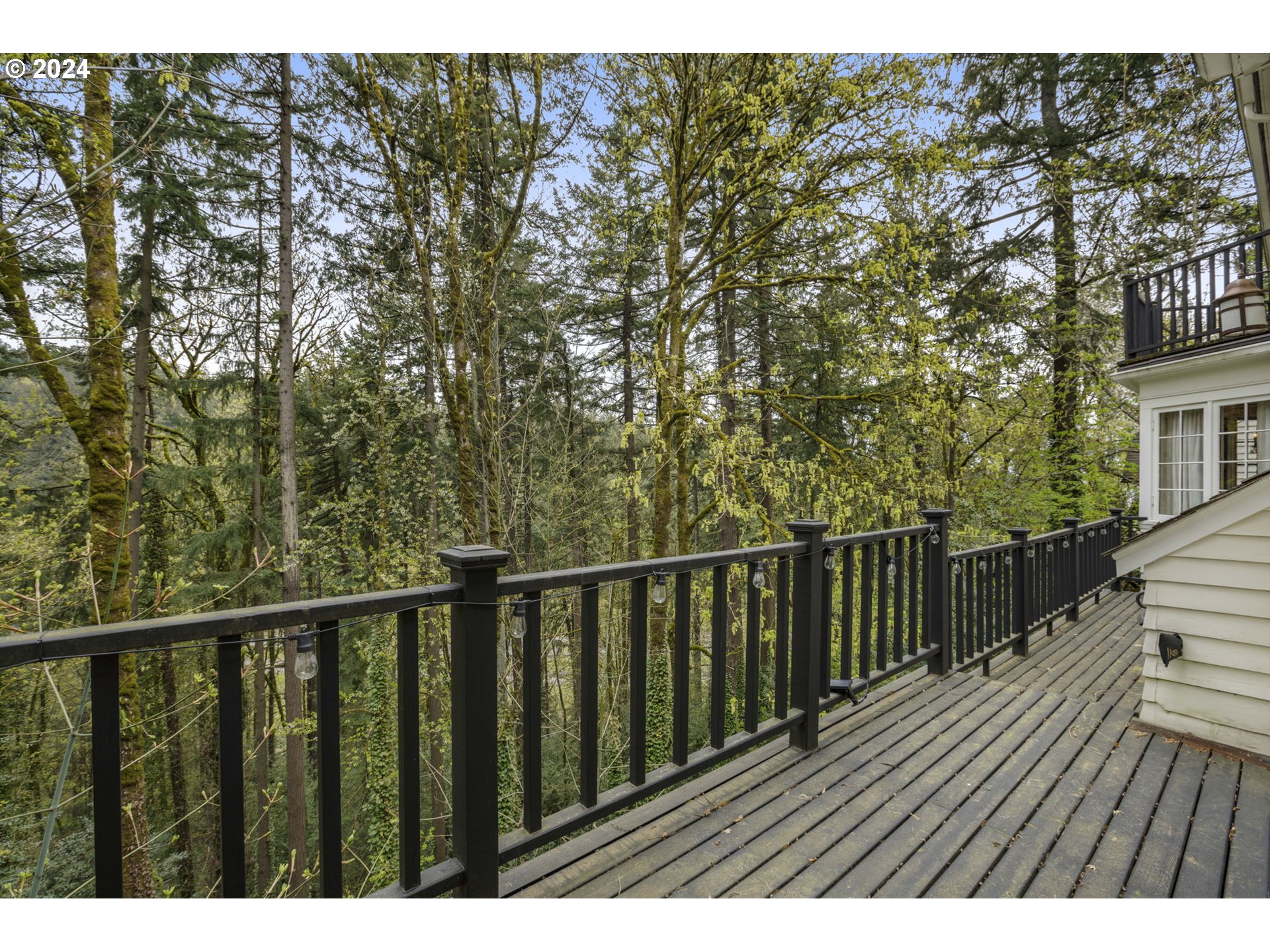 2271 Southwest Montgomery Drive Portland, OR 97201 - Photo 19 of 25 a view of balcony with wooden floor and fence