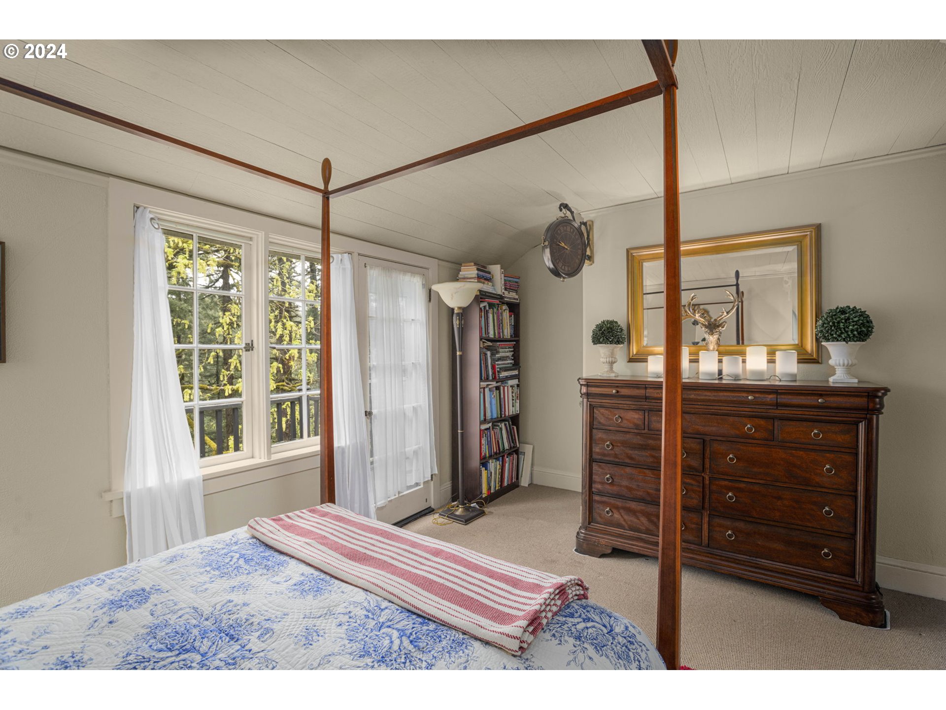 2271 Southwest Montgomery Drive Portland, OR 97201 - Photo 22 of 25 a bedroom with a bed and a dresser