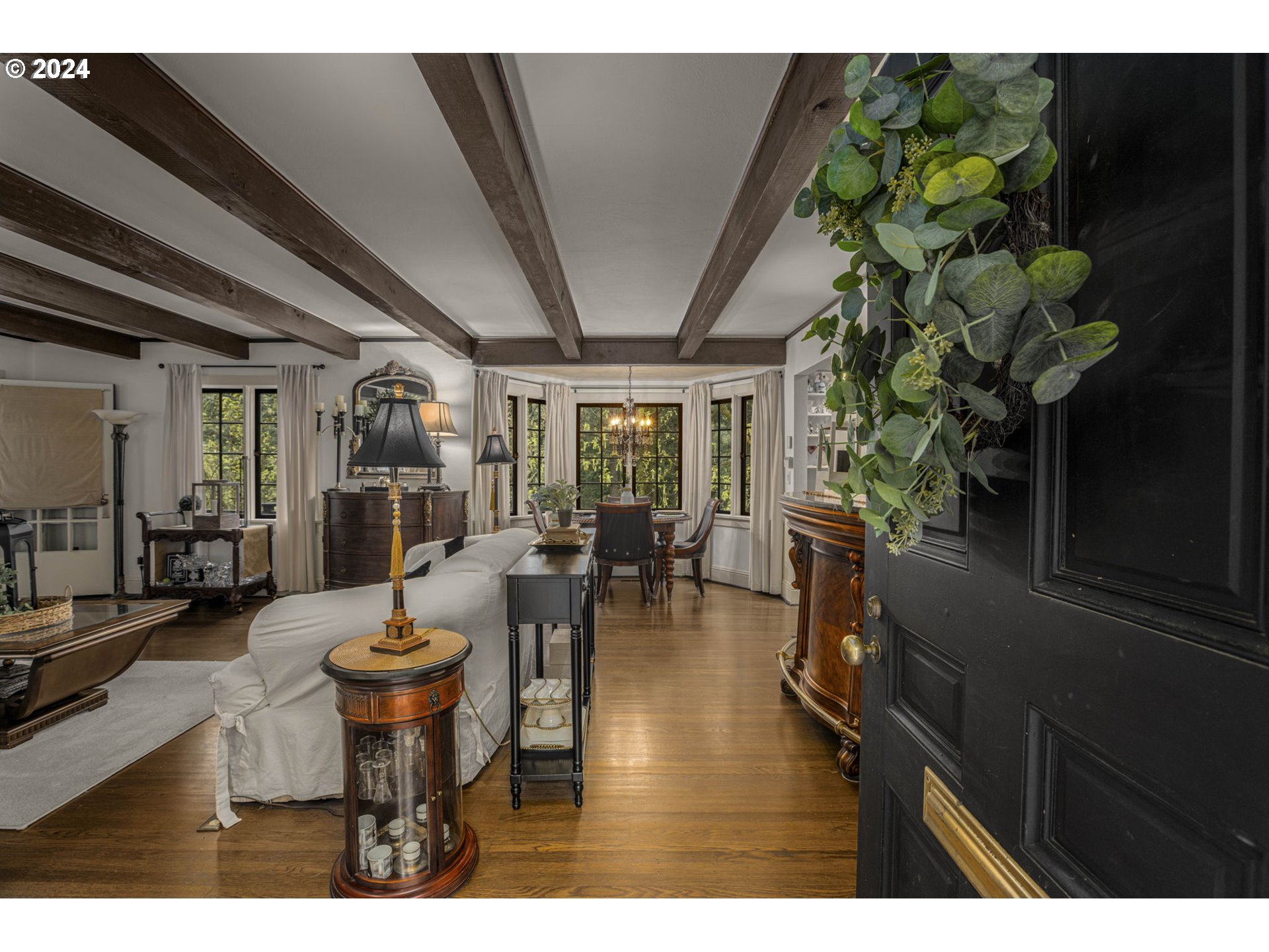 2271 Southwest Montgomery Drive Portland, OR 97201 - Photo 3 of 25 a view of a dining room with furniture window and wooden floor