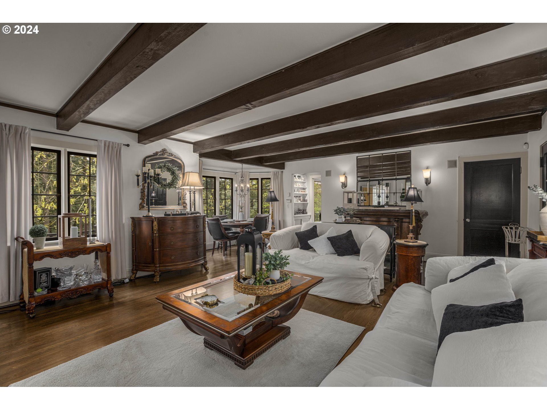 2271 Southwest Montgomery Drive Portland, OR 97201 - Photo 7 of 25 a living room with furniture and a wooden floor