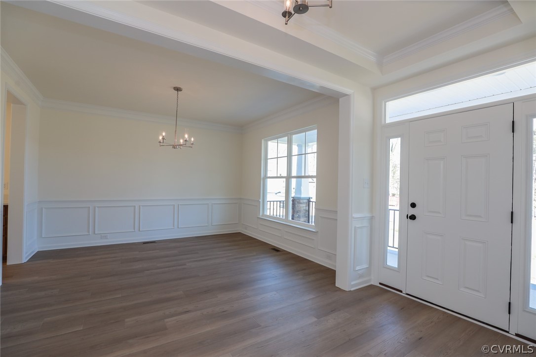 3825 Belspring Road Chester, VA 23831 - Photo 3 of 48 an empty room with wooden floor and windows