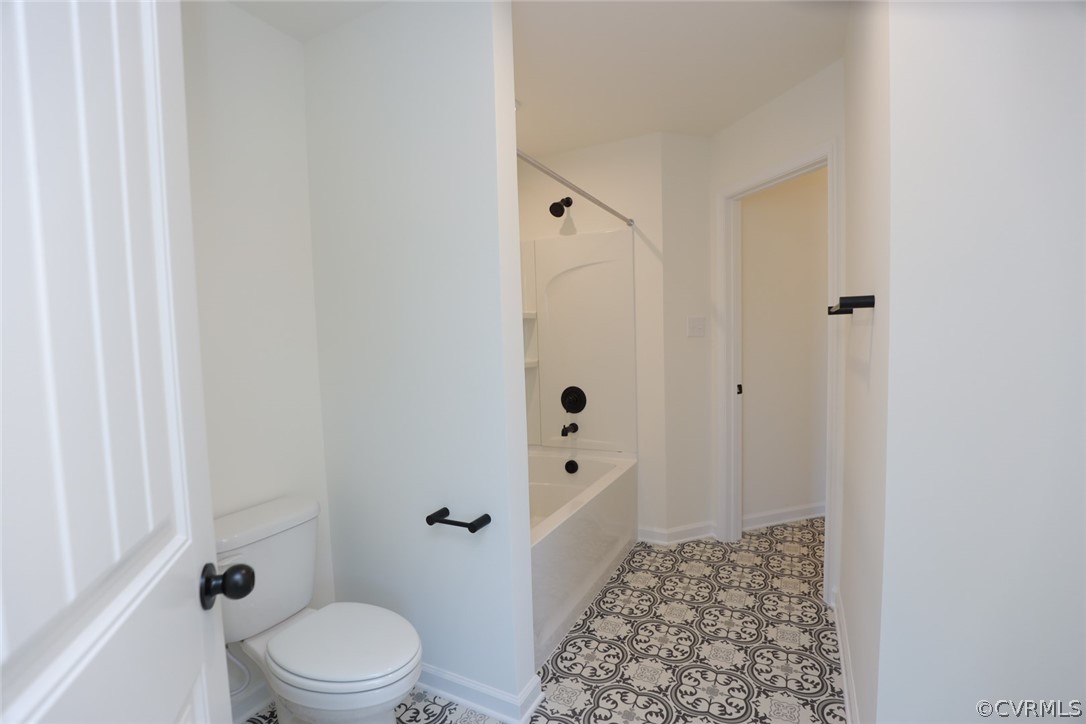 3825 Belspring Road Chester, VA 23831 - Photo 31 of 48 a bathroom with a toilet a sink and shower