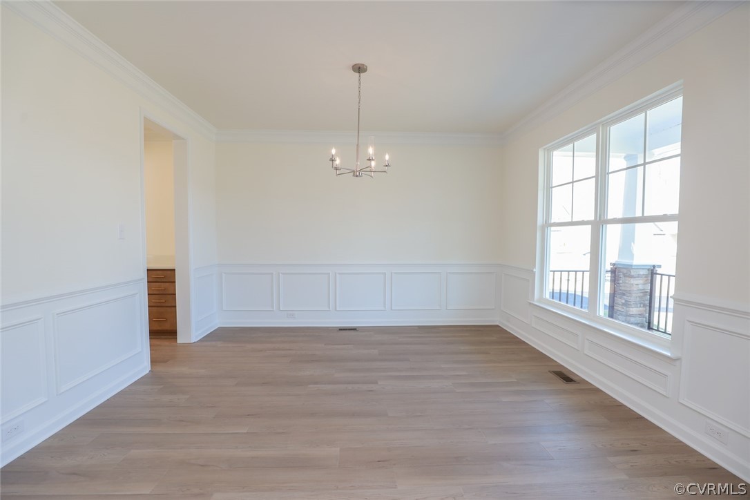 3825 Belspring Road Chester, VA 23831 - Photo 4 of 48 wooden floor in an empty room with a window