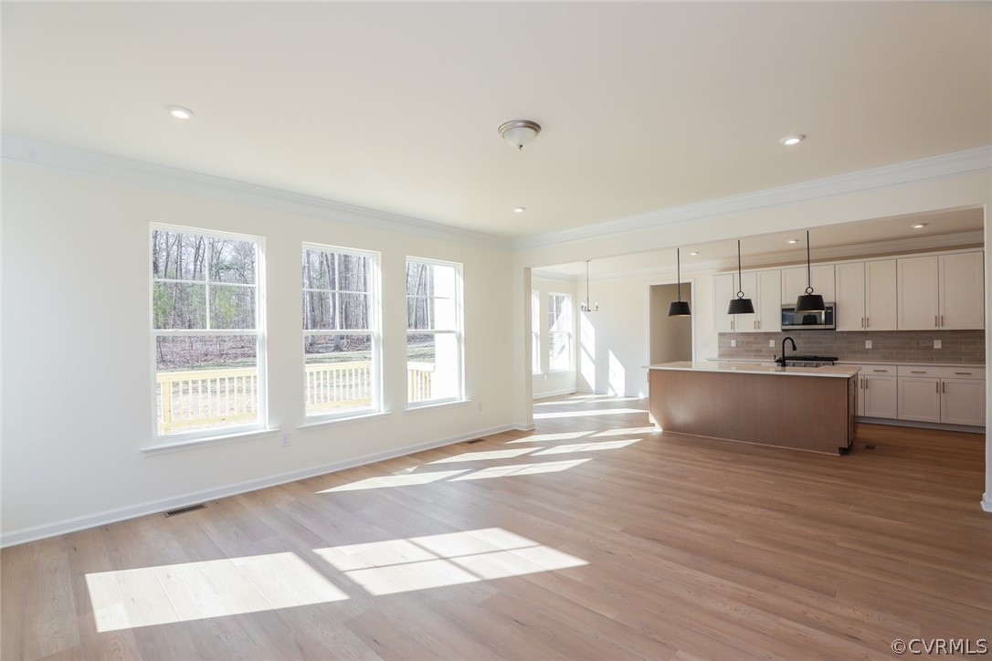 3825 Belspring Road Chester, VA 23831 - Photo 10 of 48 a view of kitchen with wooden floor and electronic appliances
