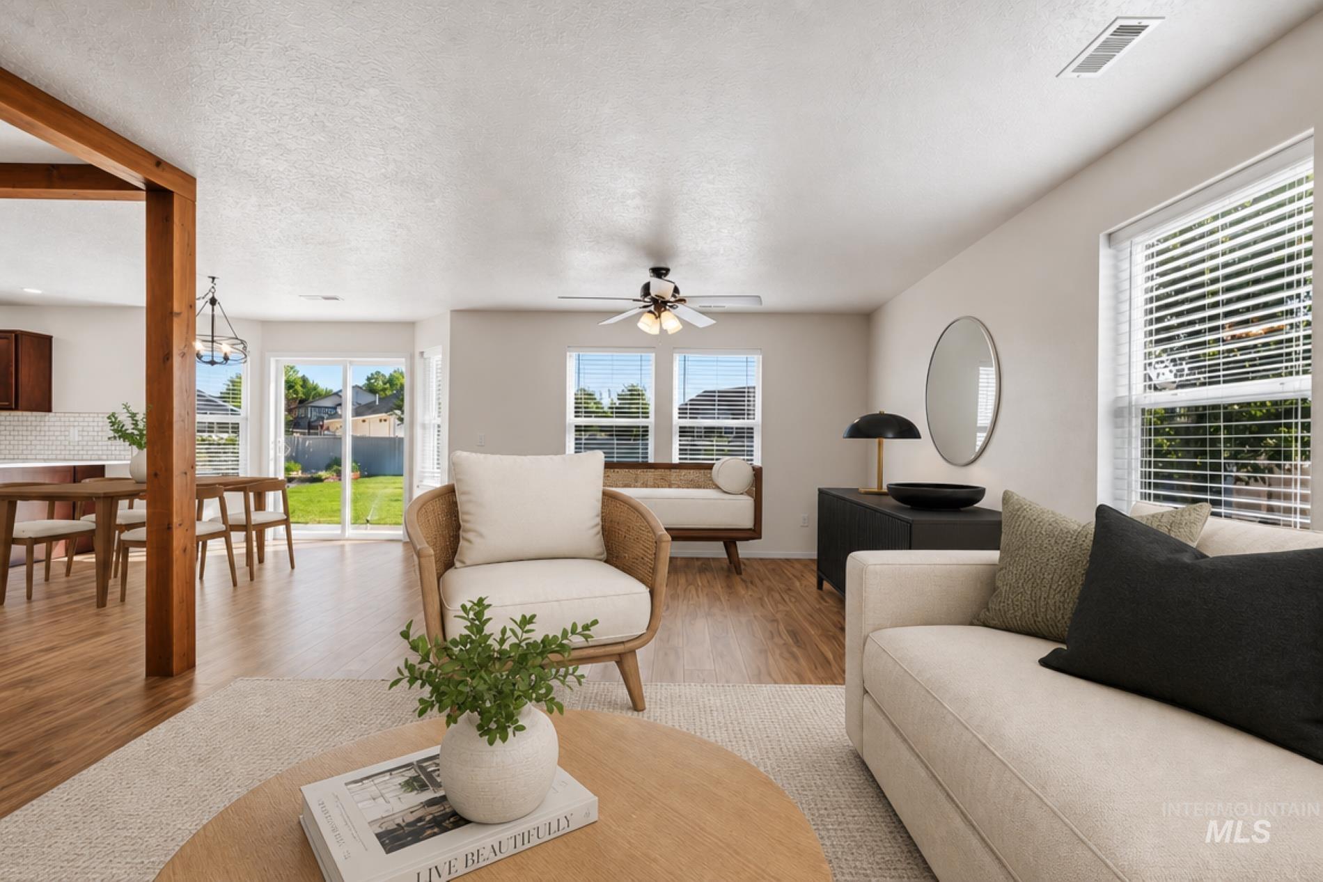 12310 West Hidden Point Drive Star, ID 83669 - Photo 4 of 48 Virtually staged living room