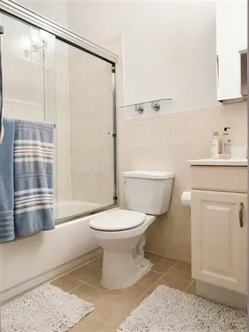 a bathroom with a toilet and a sink