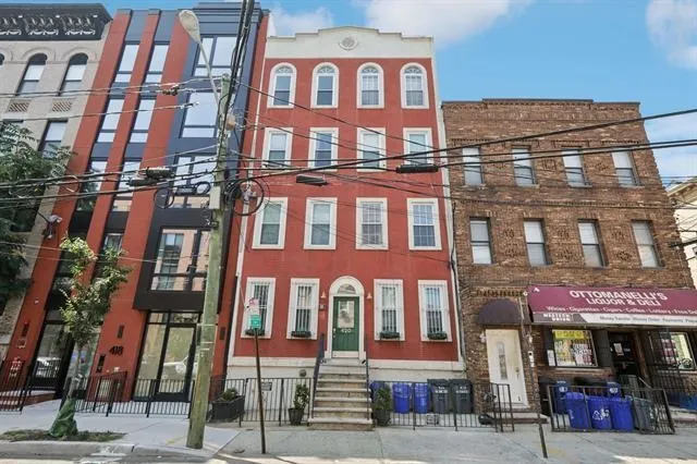 a front view of a multi story building