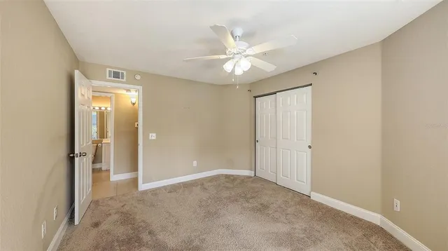 a bathroom with a sink a large mirror and a shower