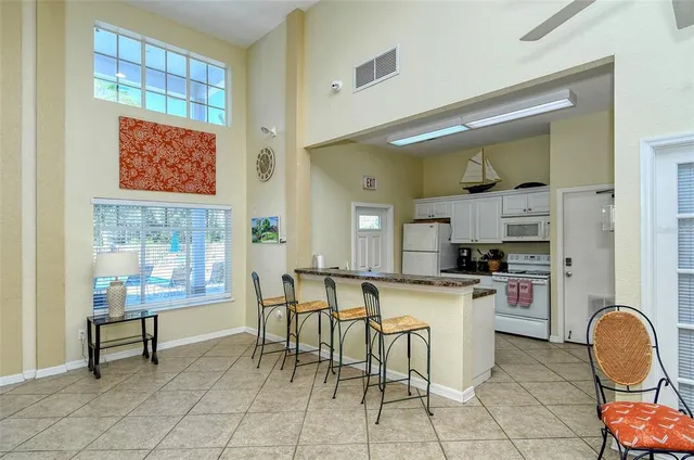 a living room with bookshelf and a book shelf
