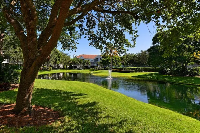 a view of swimming pool with a backyard