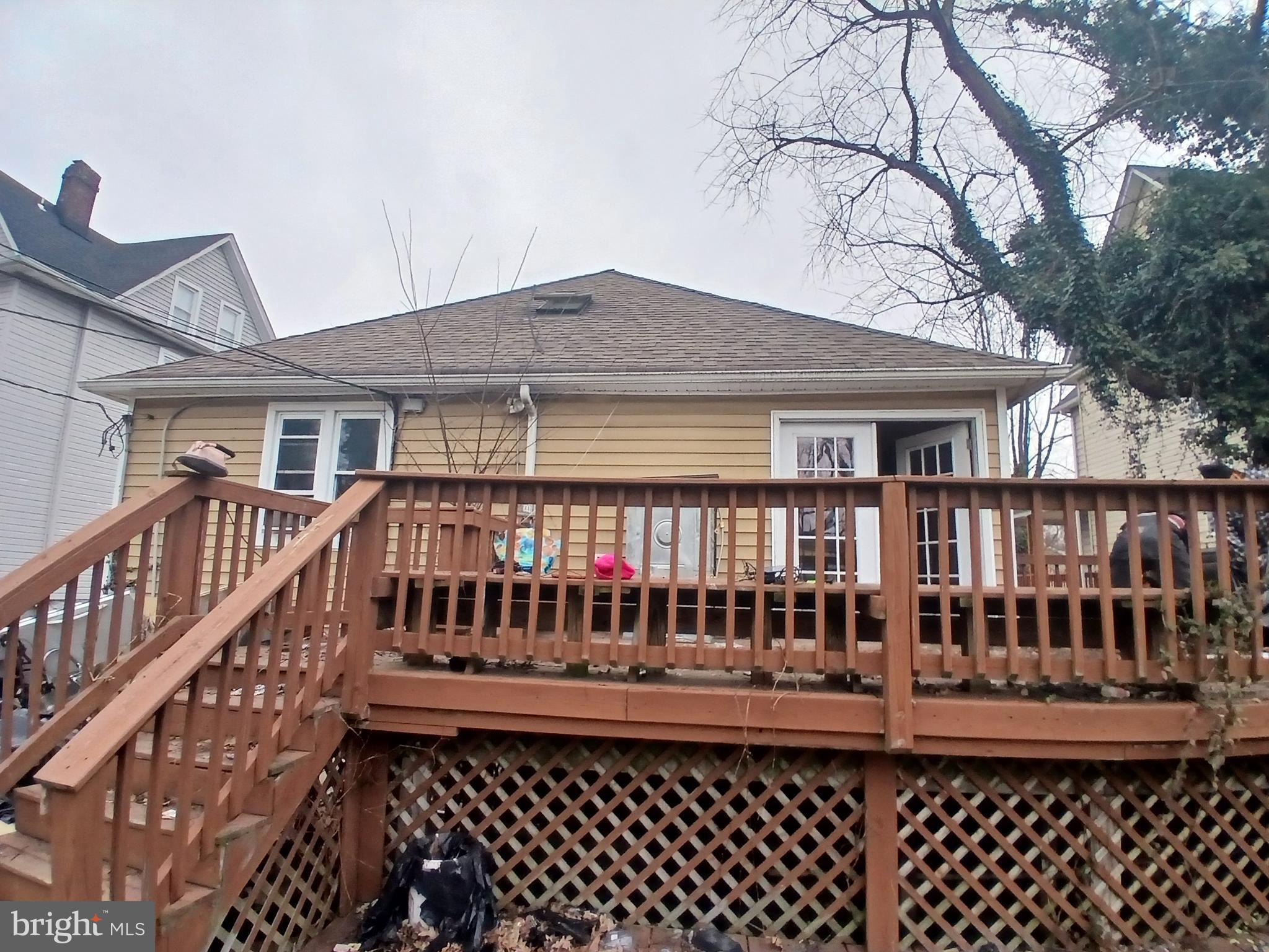 4003 Springdale Avenue Baltimore, MD 21207 - Photo 11 of 12 a view of a house with a deck