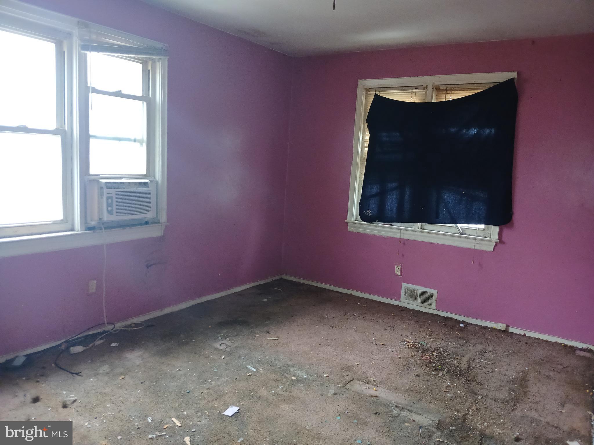 4003 Springdale Avenue Baltimore, MD 21207 - Photo 5 of 12 a view of an empty room with a window