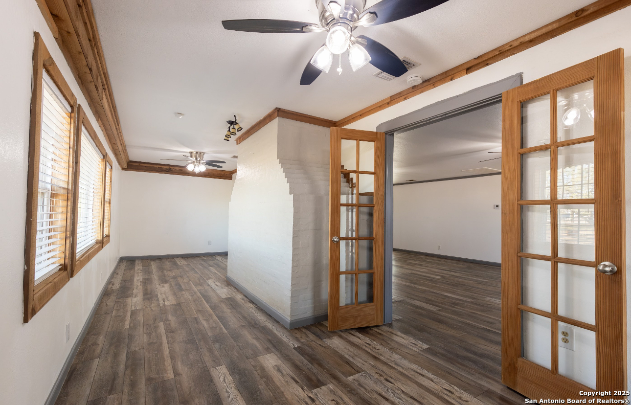 1510 Corgey Road Pleasanton, TX 78064 - Photo 11 of 34 a view of entryway with wooden floor