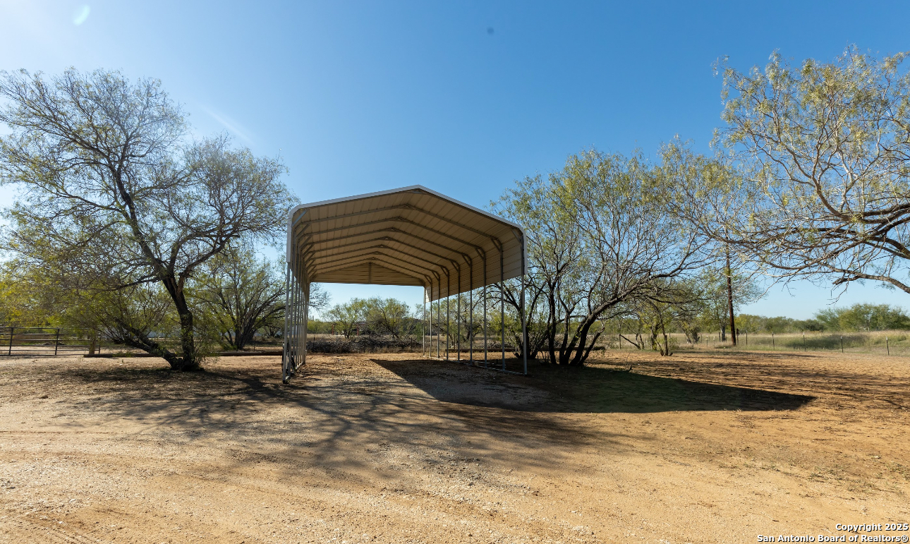 1510 Corgey Road Pleasanton, TX 78064 - Photo 21 of 34 a view of backyard with green space