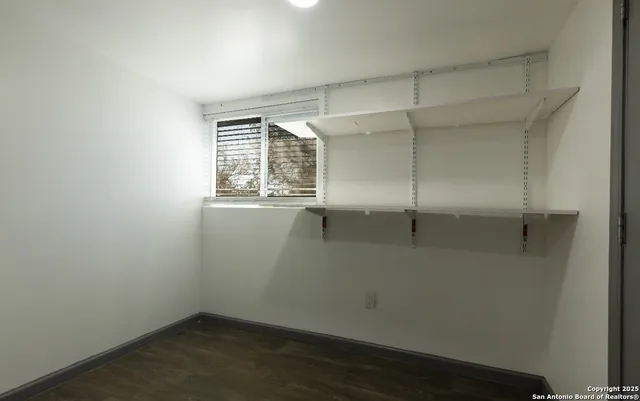 an empty room with a window