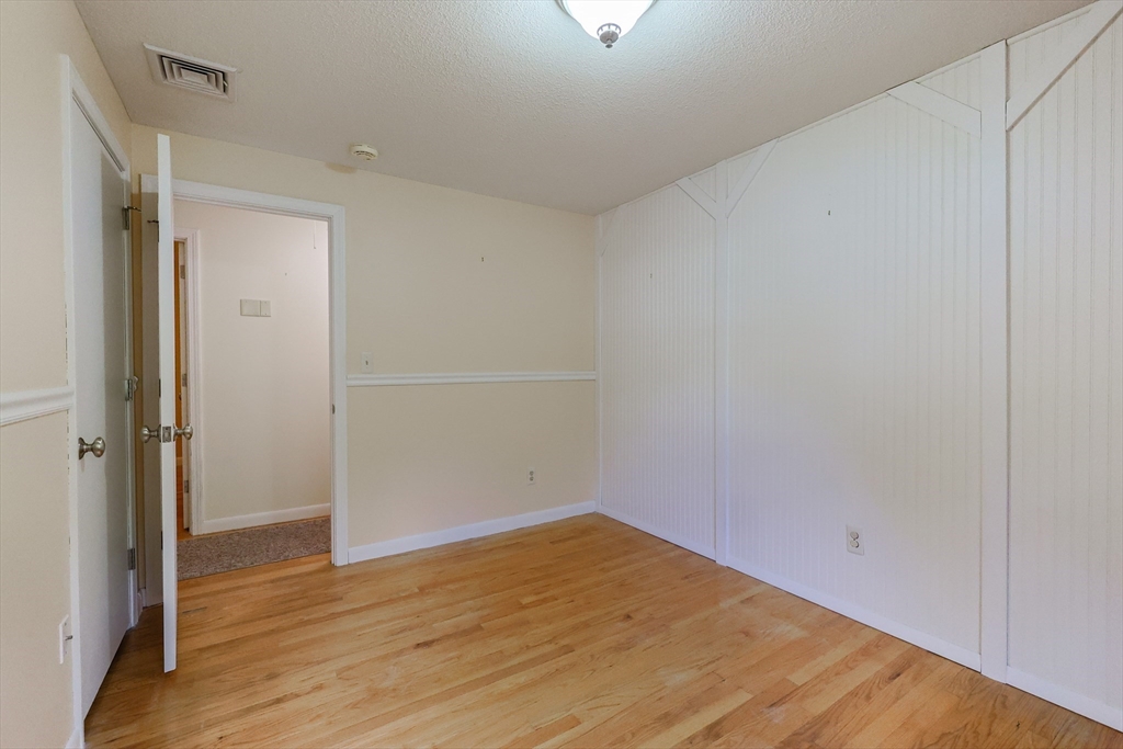 37 Oakleaf Drive Mansfield, MA 02048 - Photo 13 of 36 wooden floor in an empty room