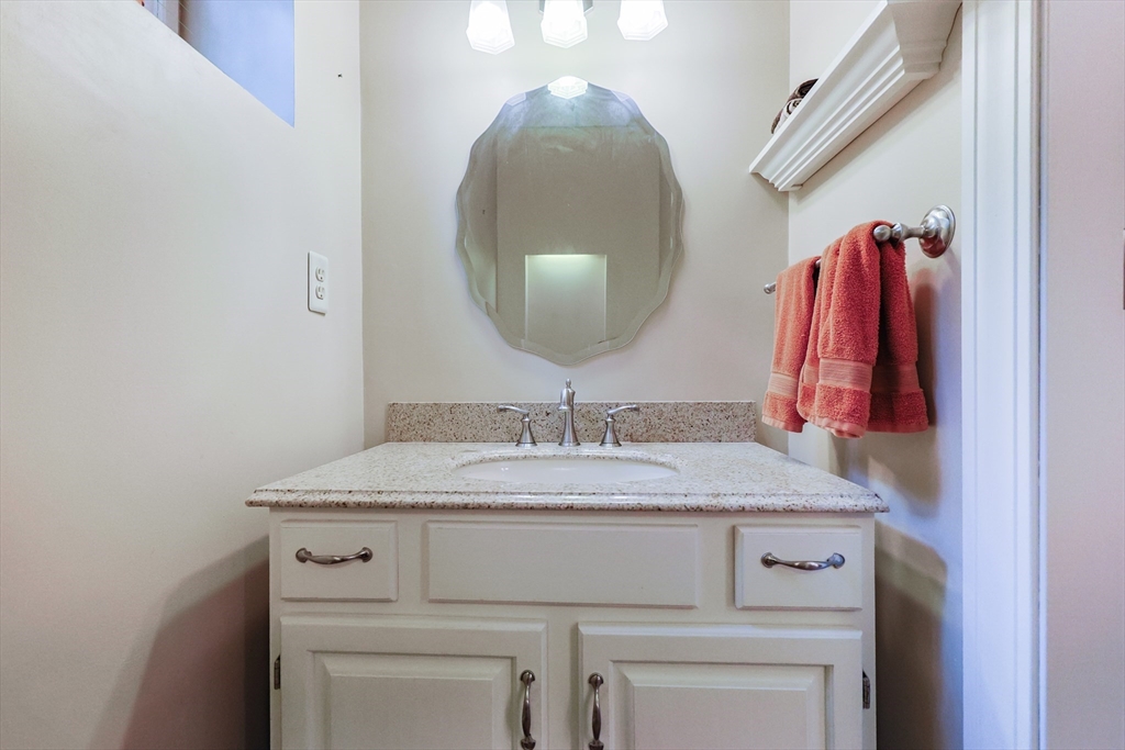 37 Oakleaf Drive Mansfield, MA 02048 - Photo 18 of 36 a close view of a sink and a mirror