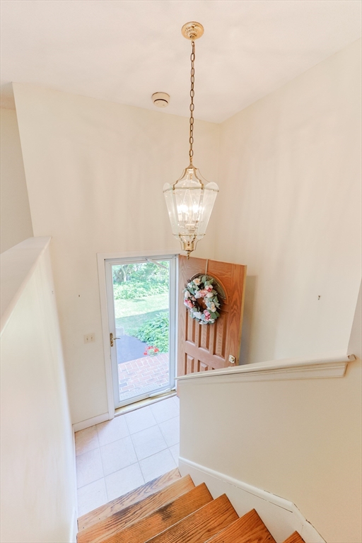 37 Oakleaf Drive Mansfield, MA 02048 - Photo 4 of 36 a view of a room with a window and wooden floor