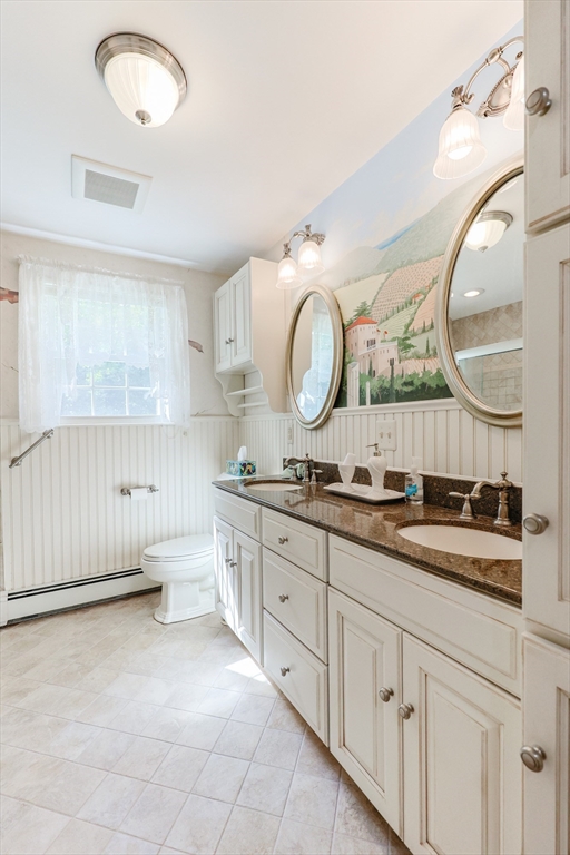 37 Oakleaf Drive Mansfield, MA 02048 - Photo 9 of 36 a spacious bathroom with a double vanity sink and a mirror