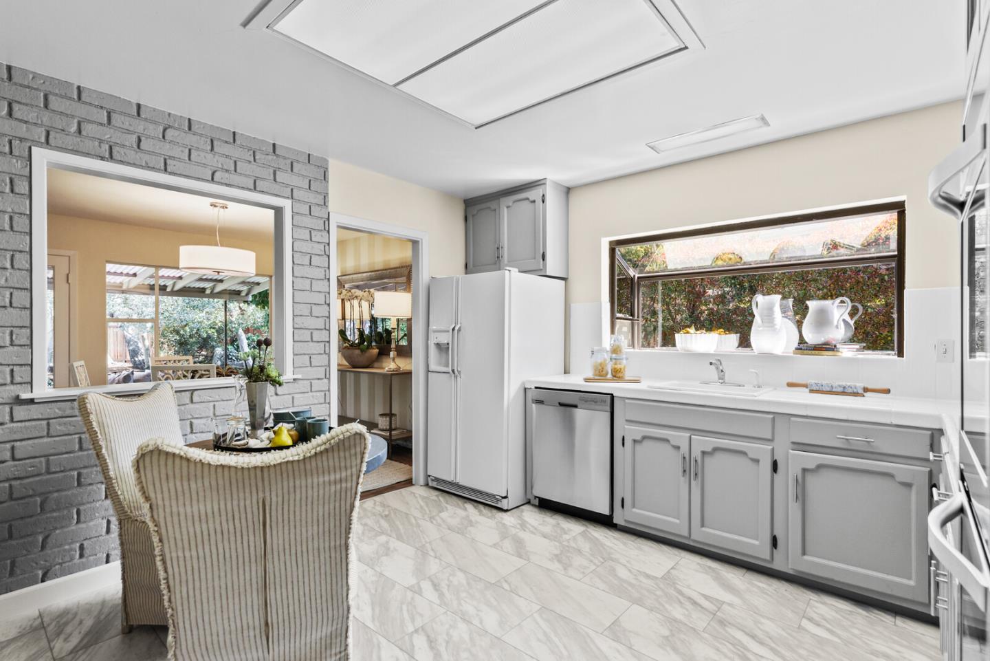 100 Parkview Drive San Bruno, CA 94066 - Photo 11 of 25 a dining room with furniture and window