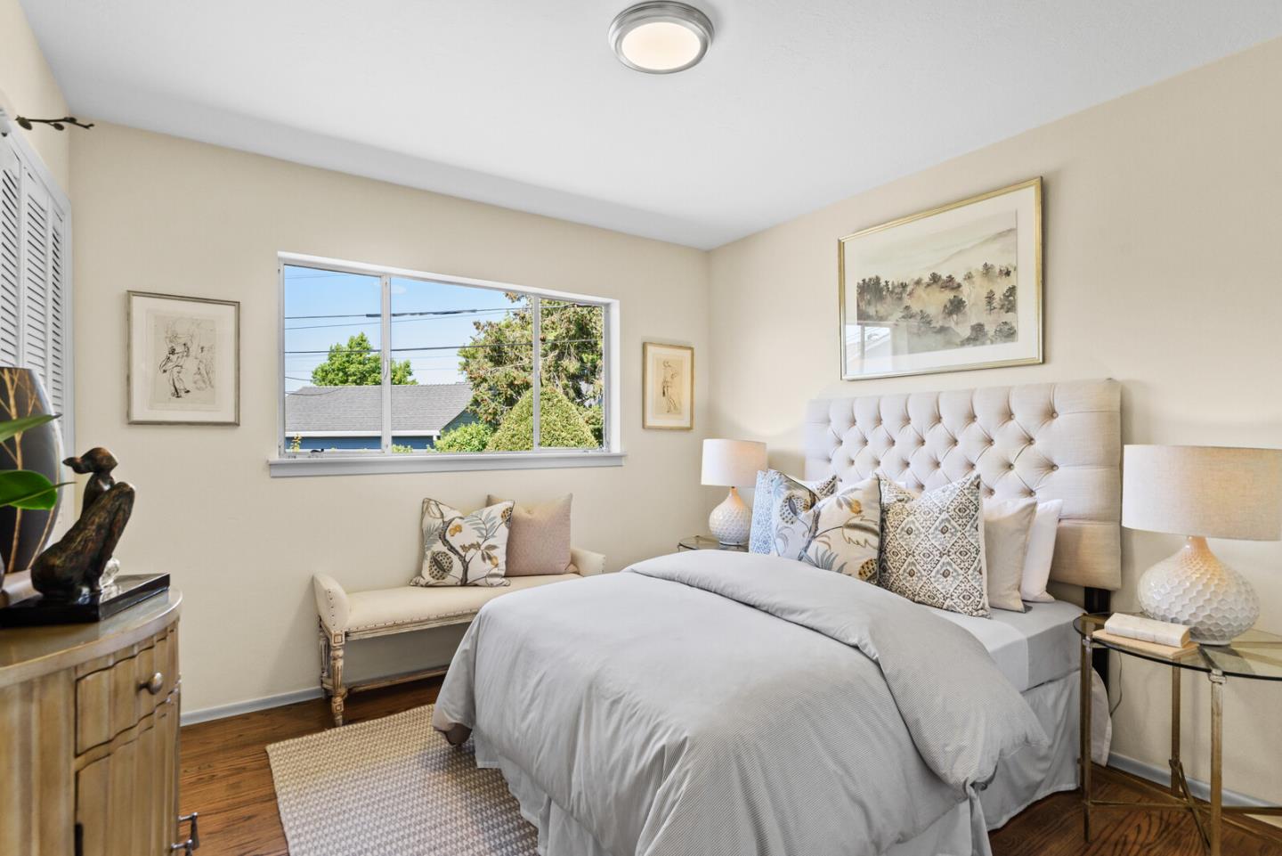 100 Parkview Drive San Bruno, CA 94066 - Photo 17 of 25 a bedroom with a bed and a couch