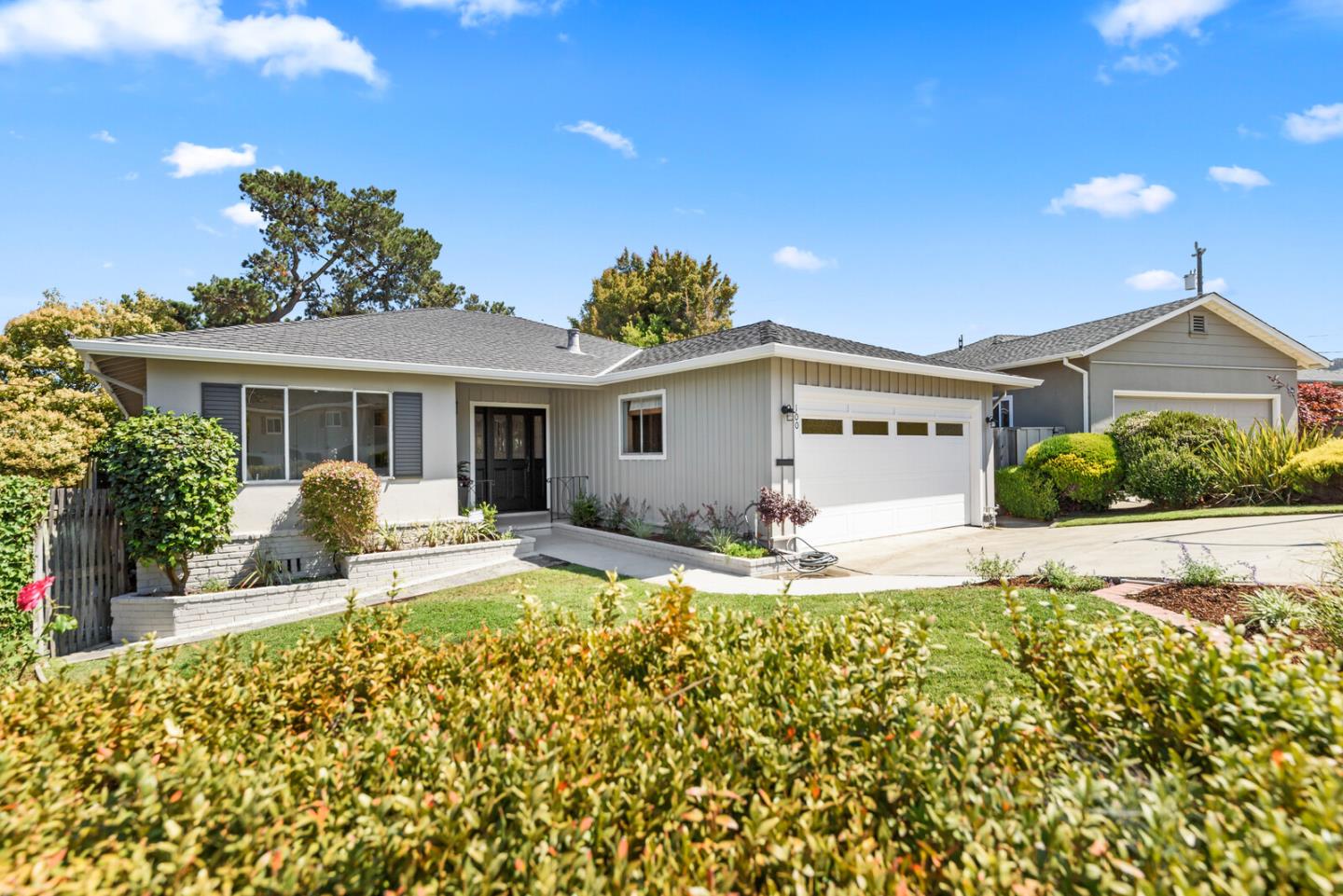 100 Parkview Drive San Bruno, CA 94066 - Photo 2 of 25 a house view with a garden space