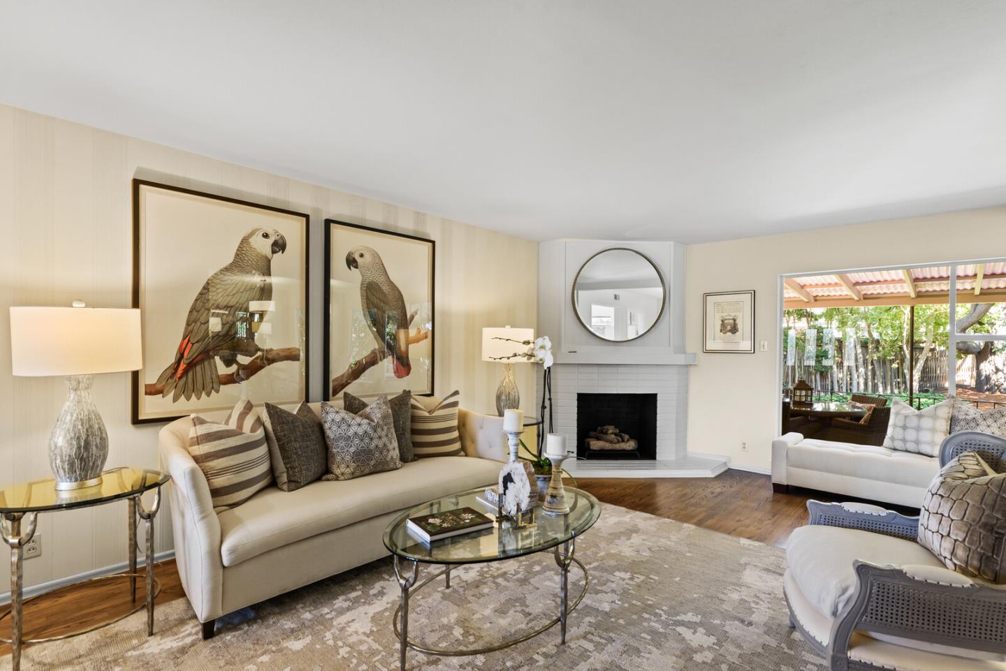 100 Parkview Drive San Bruno, CA 94066 - Photo 6 of 25 a living room with furniture a fireplace and a large window