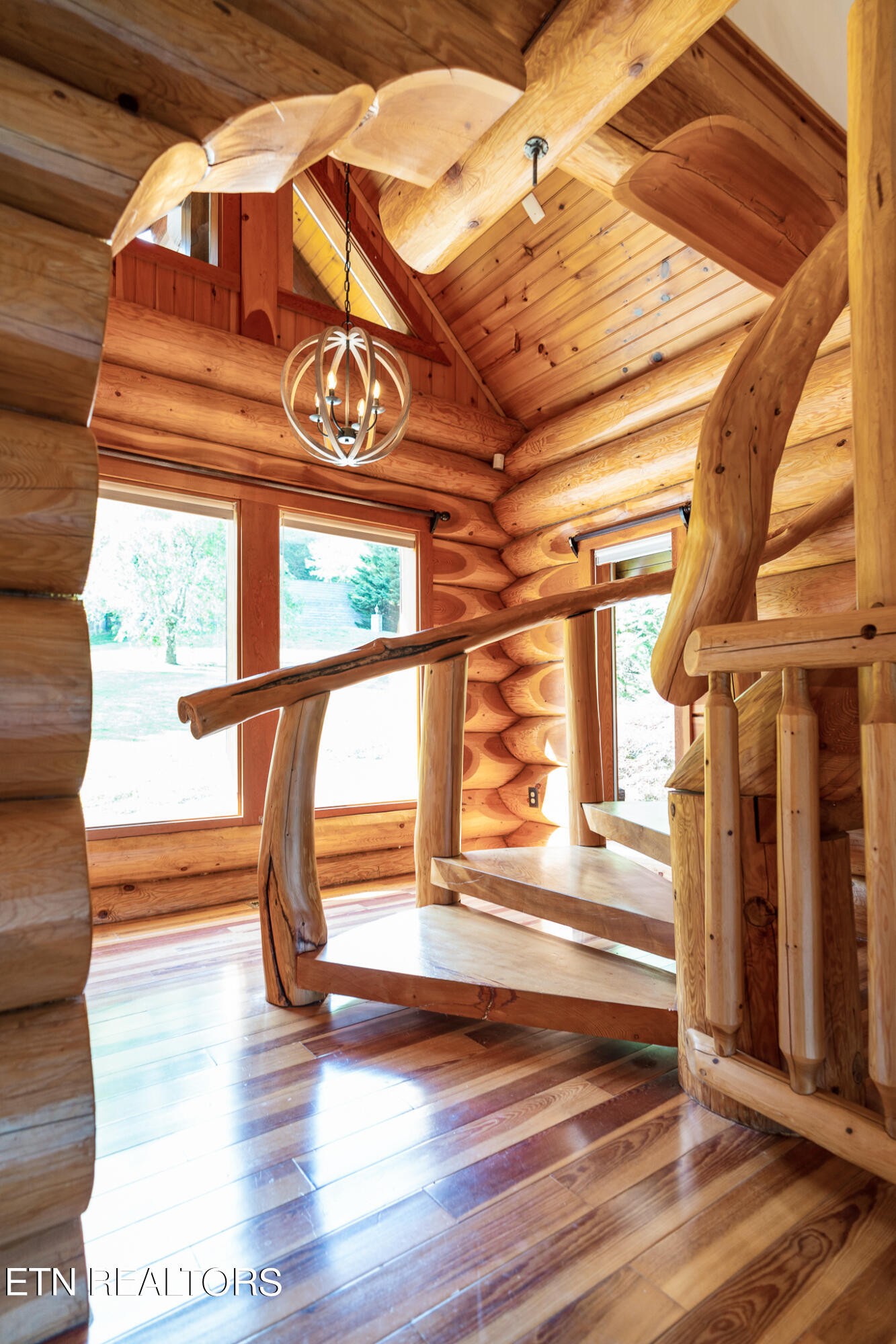 546 Bluff View Road New Tazewell, TN 37825 - Photo 17 of 60 a view of entryway with a window and wooden floor
