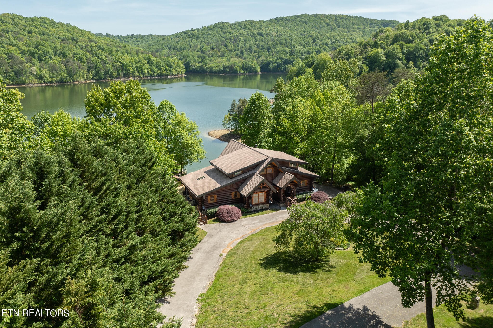 546 Bluff View Road New Tazewell, TN 37825 - Photo 51 of 60 a aerial view of a house with a yard and lake view