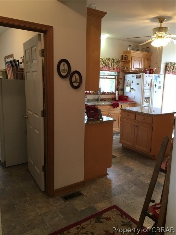 2573 Wright Road Saluda, VA 23149 - Photo 12 of 30 view to laundry room and kitchen