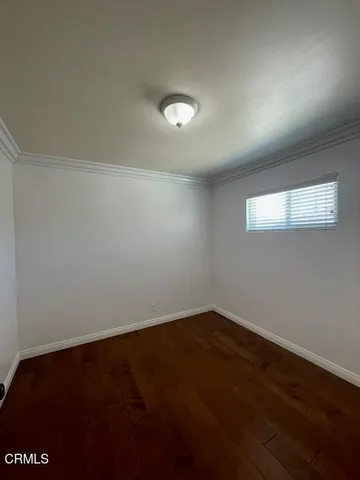 an empty room with closet area