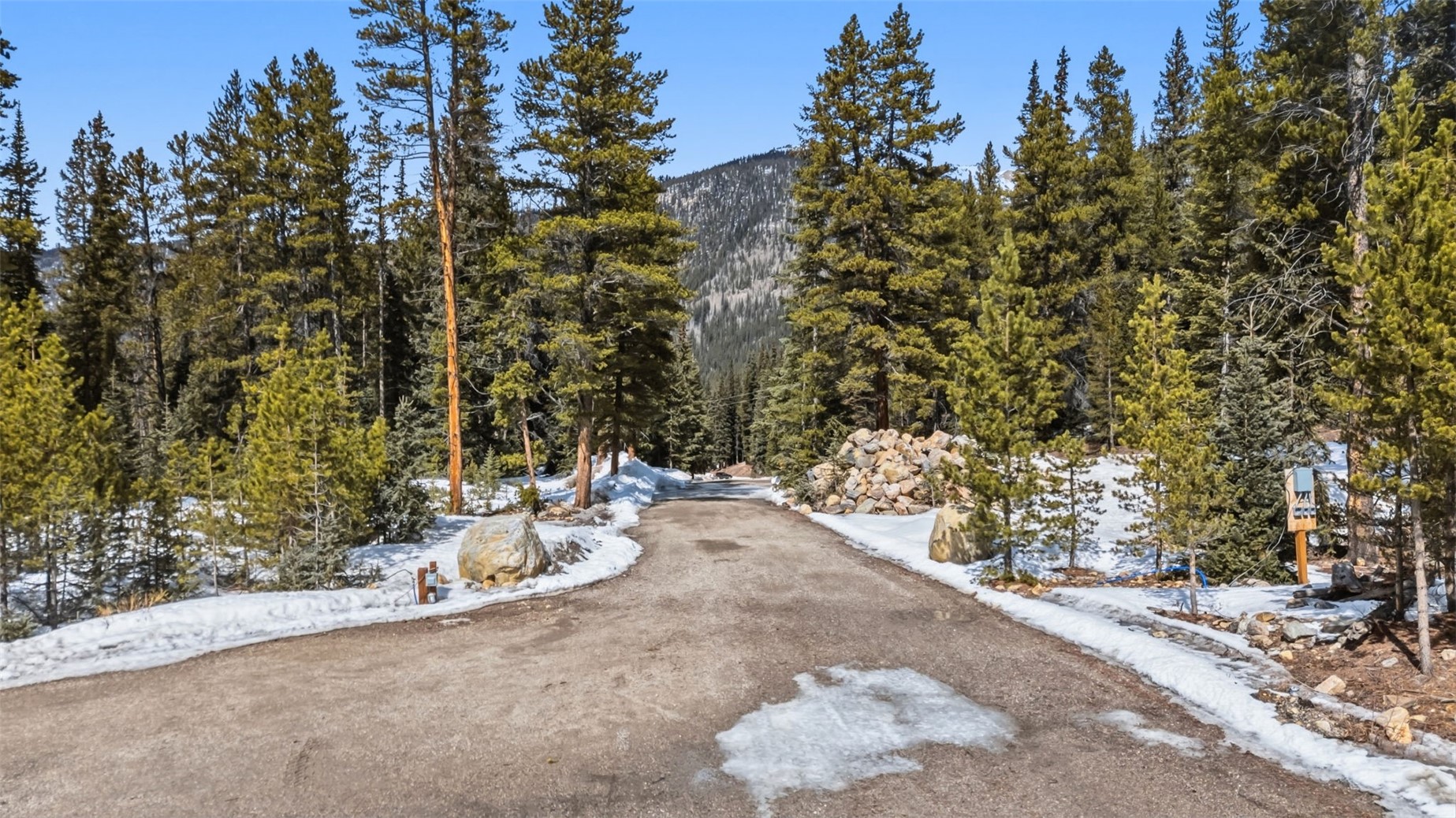 5080 Montezuma Road Dillon, CO 80435 - Photo 2 of 24 a view of a patio with table and chairs and potted plants
