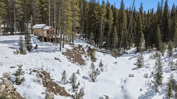 a view of a covered with snow in the background