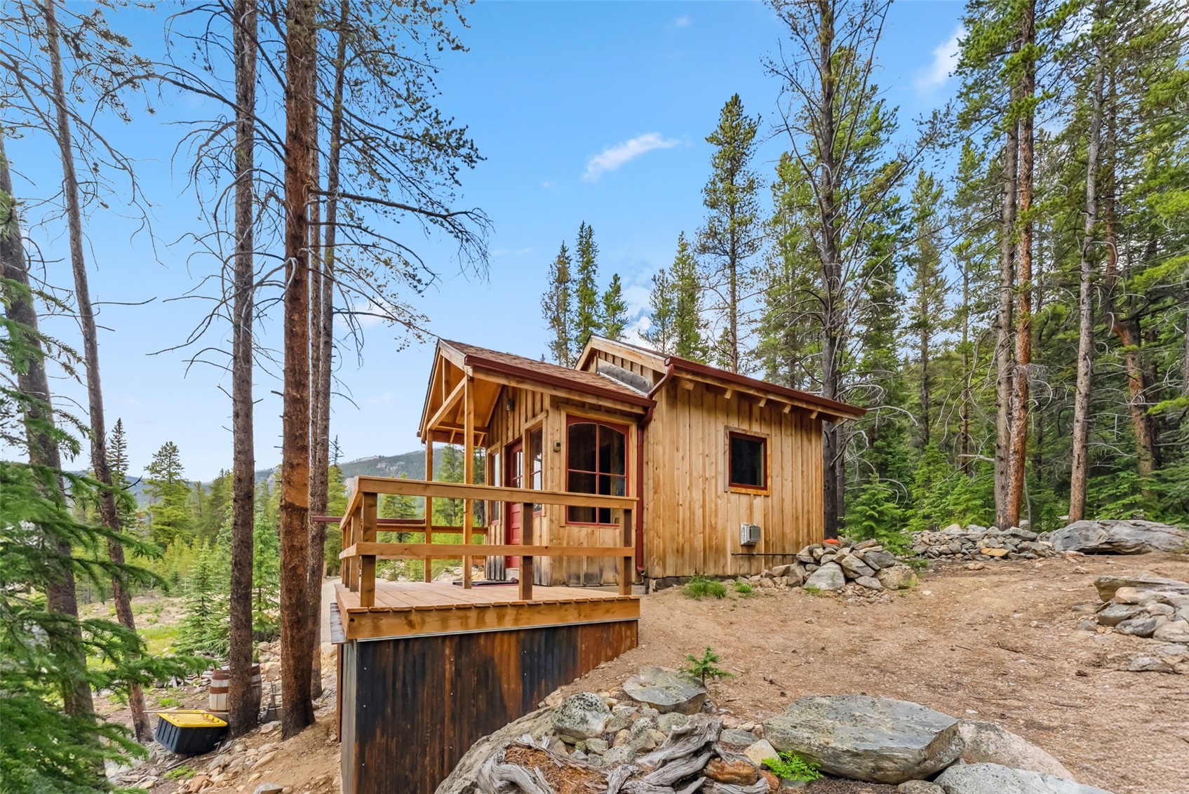 5080 Montezuma Road Dillon, CO 80435 - Photo 3 of 24 a view of a house with a bed and chair