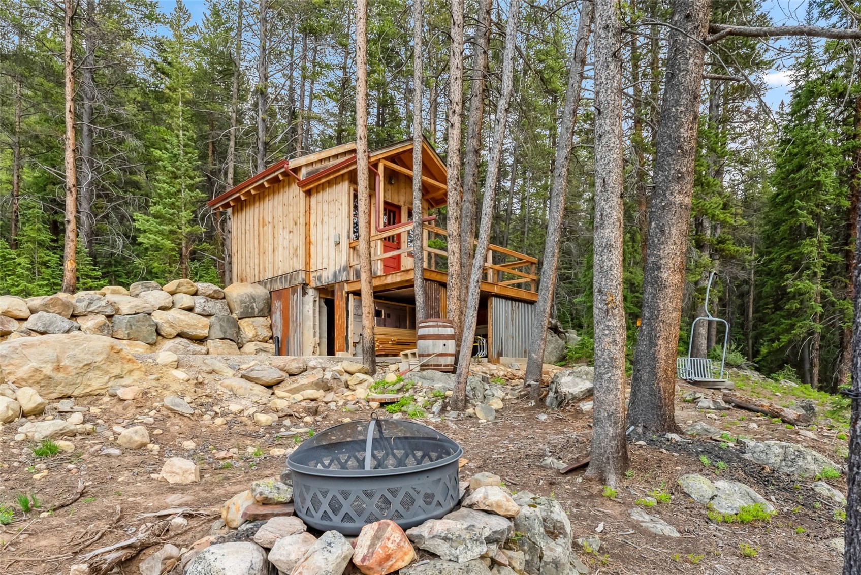 5080 Montezuma Road Dillon, CO 80435 - Photo 10 of 24 a backyard of a house with table and chairs
