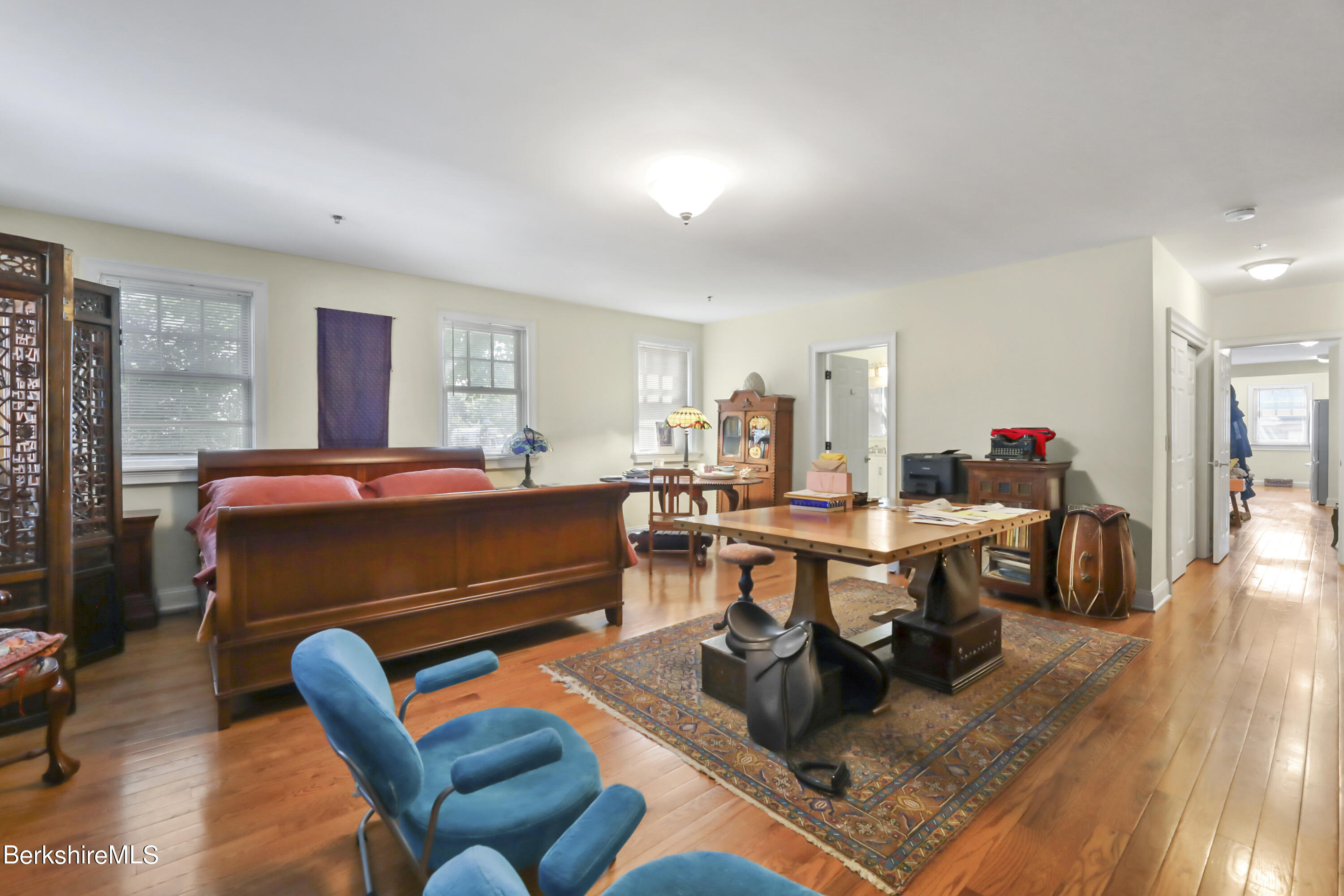 29 Main Street West Stockbridge, MA 01266 - Photo 18 of 51 a living room with furniture a rug and a table