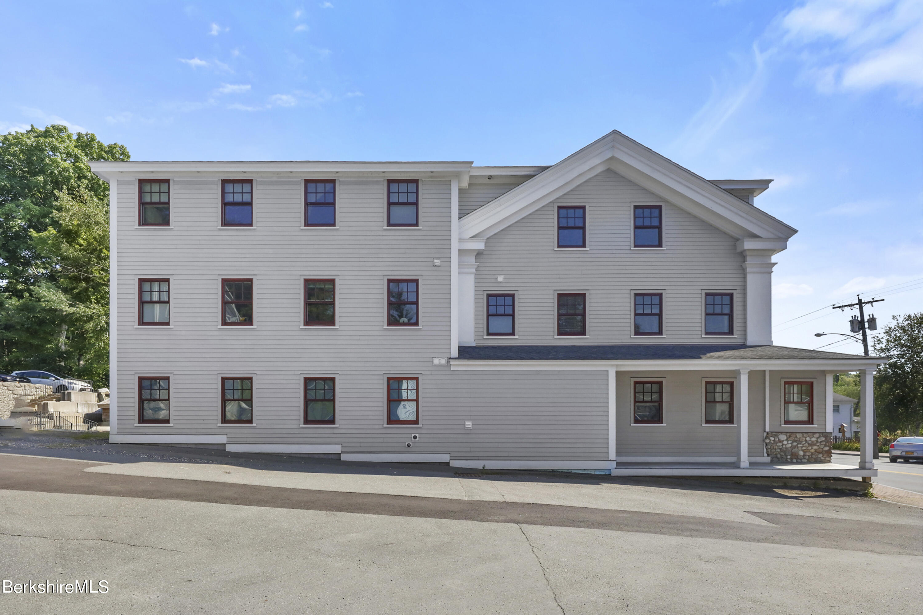 29 Main Street West Stockbridge, MA 01266 - Photo 4 of 51 a view of a white house with a large windows