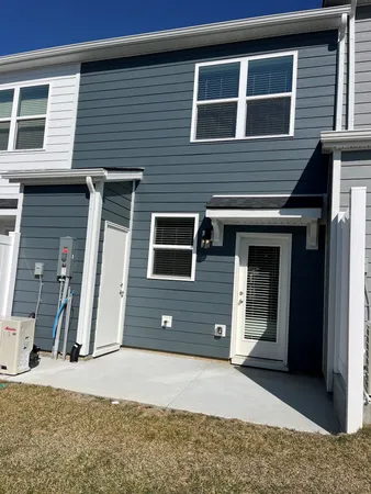 a view of a house with a door and a door
