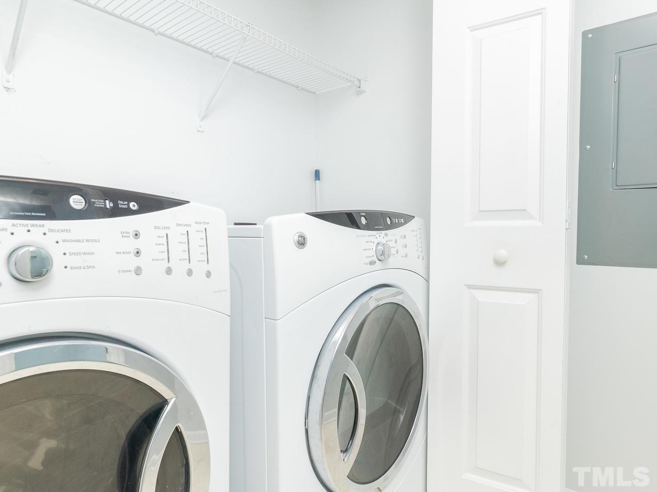 5801 Weddington Road Raleigh, NC 27610 - Photo 15 of 28 a utility room with dryer and washer