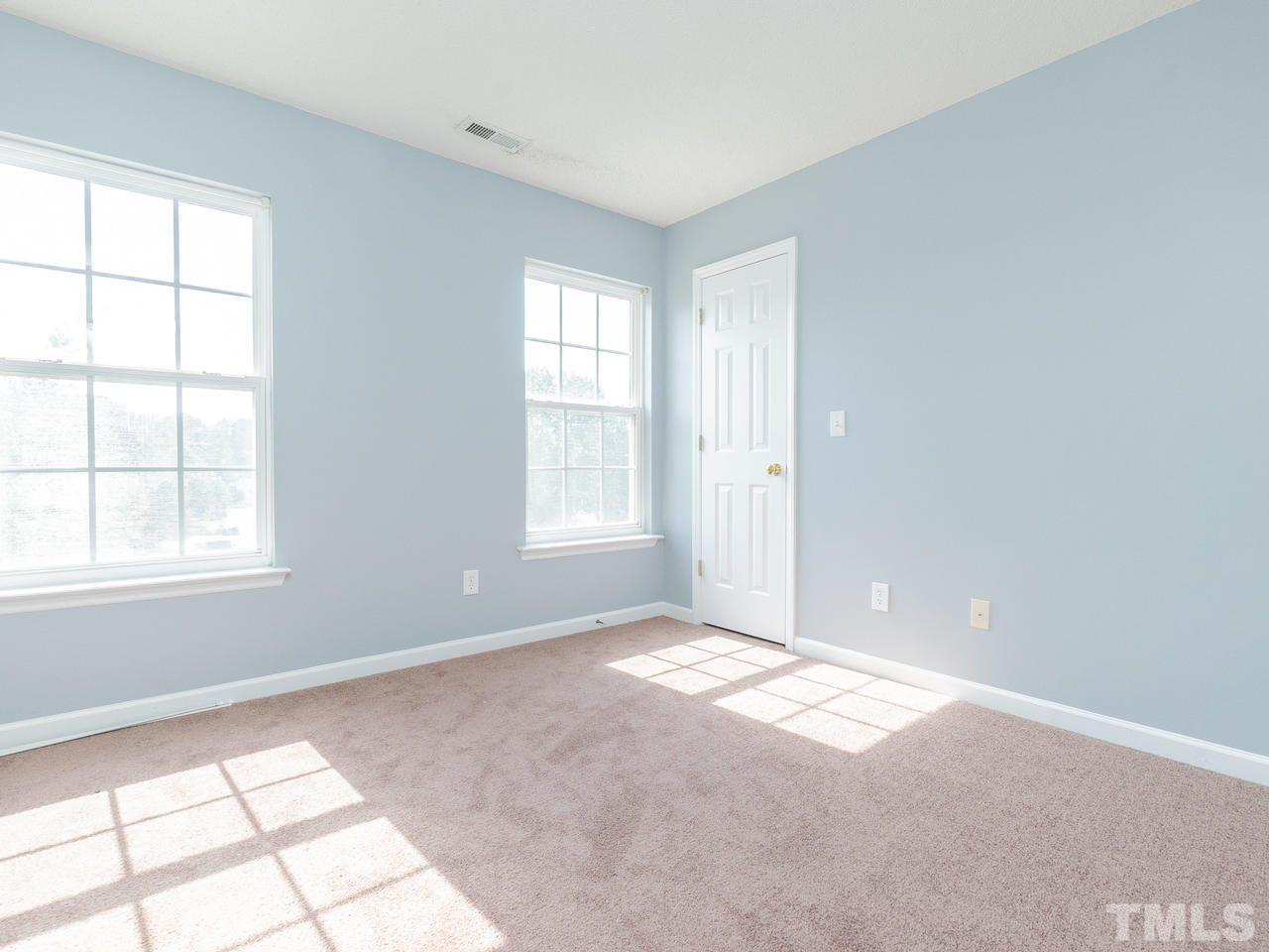 5801 Weddington Road Raleigh, NC 27610 - Photo 17 of 28 an empty room with windows